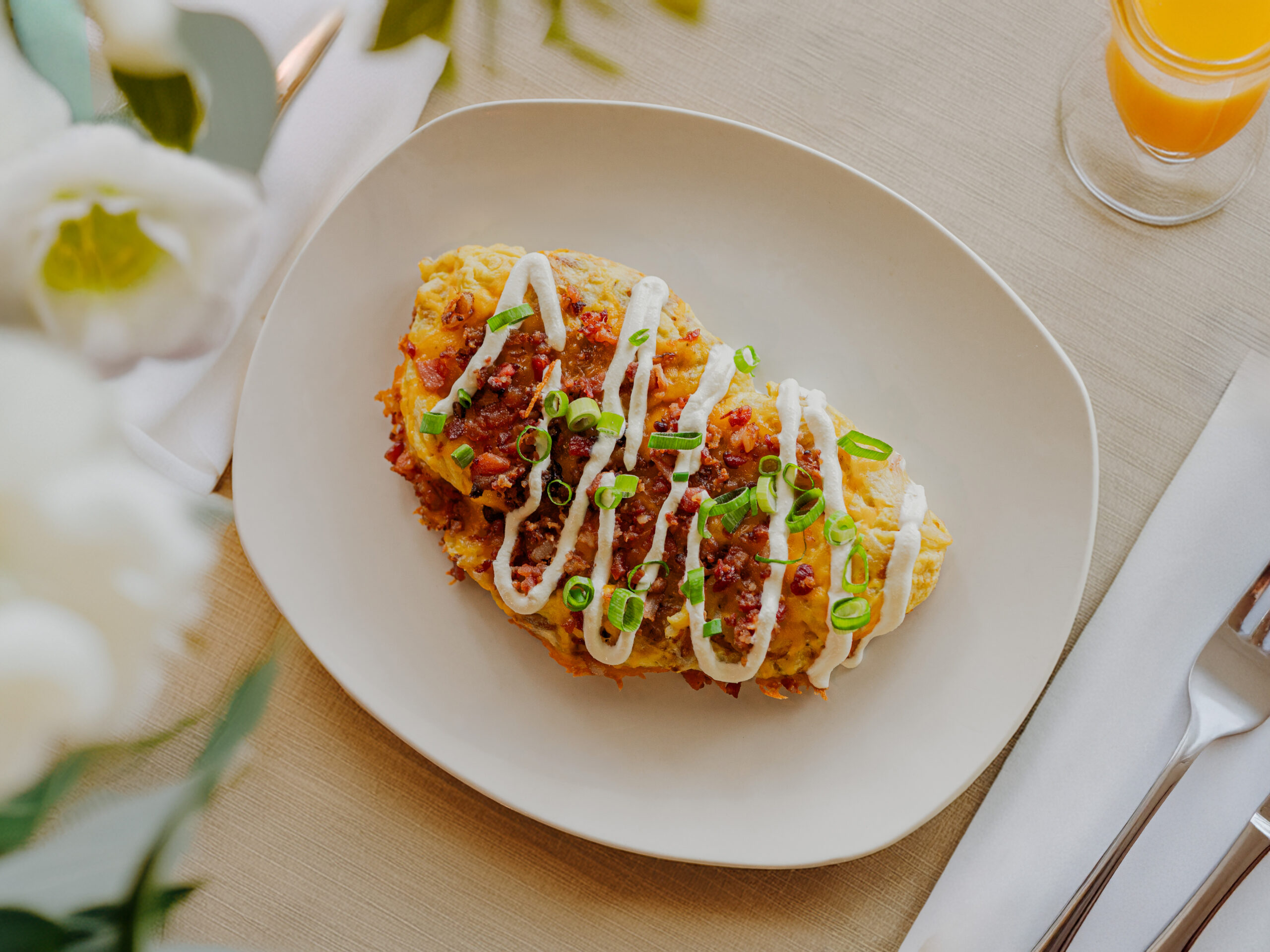 Loaded Baked Potato Omelette at Cafe on the Grove
